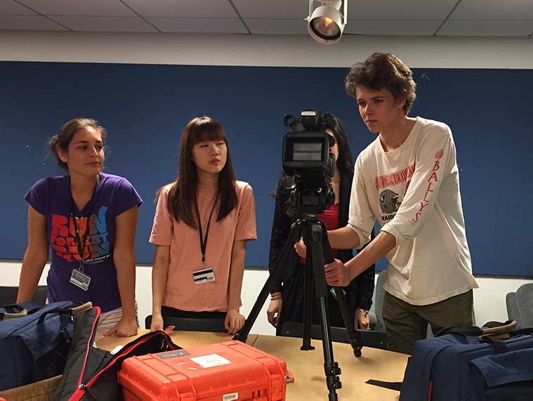 Students operating a camera